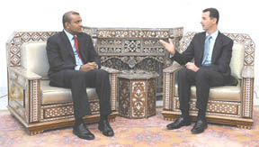 President Bharrat Jagdeo (left) in a meeting with Syrian President Bashar al-Assad (GINA photo)