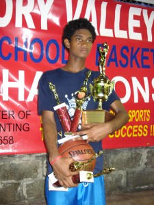 Flashback! Akeem Kanhai who was the star of the 2008 Royals School tournament displays his individual trophies as his school, MHS, swept through the tournament. (Photo courtesy of Linden Alphonso) 