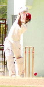 Guyana’s skipper Sewnarine Chattergoon executes a lovely front-foot drive during his unbeaten 72 in his team’s second innings. (Photo by Orlando Charles)   