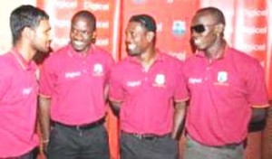  West Indies vice-captain Denesh Ramdin (left) chats with team rookies Nelon Pascal, Dale Richards and Lionel Baker (from left to right) prior to their departure for England on Thursday. (Photo by Digicel Cricket) 