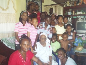 Birthday Love: Adina Capitus (centre) surrounded by her grandchildren and great-grandchildren at her Bagotville home yesterday.  