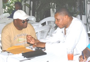 Chairman of the Dorcas Medical Mission Dr Sidley Mullings (right) chats with Dr Dalgleish Joseph at a prayer breakfast held yesterday at Kirkpatrick Garden Reception Room, Meadowbrook Gardens, to launch its outreach in Guyana. The outreach which includes medical services as well as the distribution of food, clothing and medicines will be held at three locations in Georgetown and New Amsterdam starting tomorrow and ending on Thursday. (Photo by Jules Gibson)