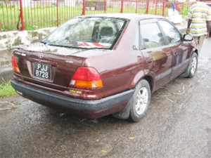 The first vehicle which was hit by the hire car. 