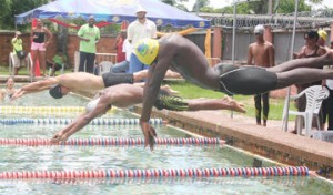 We are the champions! Suriname’s victorious boys 200 metres freestyle relay team. (Orlando Charles photo) 