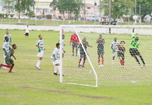 Part of the action between Guyana and Suriname yesterday. (Orlando Charles photo) 