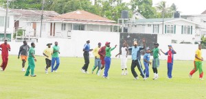 The Gizmos and Gadgets GT Pitbulls warming up before their net session at the Demerara Cricket Club ground yesterday morning. (Photo by Orlando Charles) 