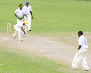 Got him! Essequibo’s Faizal Karim loses his off stump to Rajendra Nikbarran, backing camera, as wicketkeeper Dexter Solomon and Trevon Griffith look on. (Orlando Charles photo) 
