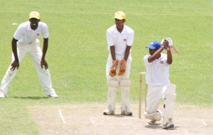 Watched by Essequibo’s Royston Alkins (hands on knees) and wicketkeeper Faizal Karim, Demerara skipper Rajendra Nikbarran executes a drive off the front foot during his unbeaten 59 yesterday. (Orlando Charles photo)   Got him! Essequibo’s Faizal Karim loses his off stump to Rajendra Nikbarran, backing camera, as wicketkeeper Dexter Solomon and Trevon Griffith look on. (Orlando Charles photo)   Photo caption:  Rajendra Nikbarran (left) receives his Man-of-the-Match trophy from GTM’s Unit Manager Edward Hackett while president of the Guyana Cricket Board (GCB) Chetram Singh (centre) looks on. (Orlando Charles photo) 