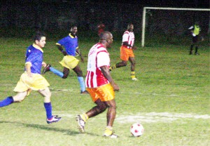 Part of the action in the Top Class versus Carib Masters matchup at the GFC ground, Bourda, Tuesday night. (An Orlando Charles photo) 
