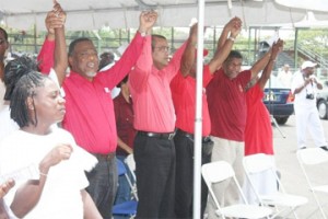 President Bharrat Jagdeo (third from left) and Prime Minister Sam Hinds (second from left) at the FITUG rally. (GINA photo)