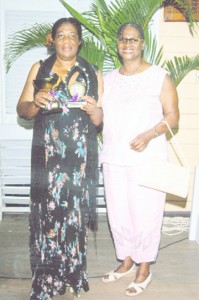 Guyana Music Festival Overall Champion Gem Rohlehr-Vogt with former headmistress of Queen’s College Wendell Roberts. 