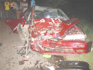 The badly mangled car after the accident (Photo by Brenon Sookram)