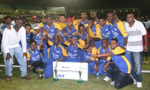 New Line Cavaliers, the inaugural DJ Stress 20/20 champions, pose with their spoils and Marketing Director of Guyana Telephone and Telegraph Company (GT&T) Wystan Robertson. (An Orlando Charles photo)