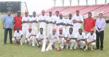 Champs again… Defending champions Berbice pose with their trophy. (Photo by Orlando Charles) 
