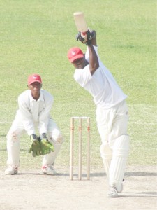 A vintage-looking Keon Joseph plays one of his  drives back down the ground during his belligerent 59 in the first trial match at the Police Sports Club ground, Eve Leary, yesterday. (Orlando Charles photograph)  
