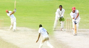 The two sides of Jonathan Foo -  On the left, national Under-19 all rounder Foo hits Seon Daniels (backing camera) back over his head for six while on the right a subdued Foo plays a forward defensive stroke as wicketkeeper Dexter Solomon pays keen attention. (Orlando Charles composite photograph) 