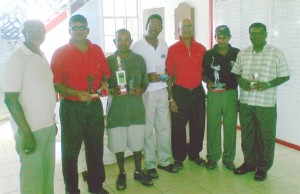 The various prize winners of the BK International-sponsored medal play golf tournament along with officials of the Lusignan Golf Club.