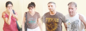 From left are Antonietta Saravella, Oronella Saravella, Giovanni Calabrese and Jean Claude Gouthier when they appeared in court in May.