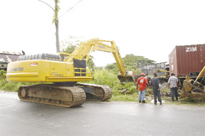 Scrap iron being removed by the Transport and Harbours Department from the South Carib Metals Company yesterday. 