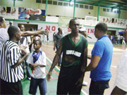 Was my shot good? This was question being posed by Wortmanvile’s centre, Royston Siland, after the game as FIFBA referee Sherwin Henry (left) and Simian Francis of HJTV (right) explain that  time had expired before the basket was scored.  