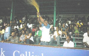 “Let’s sweep them out”, shouts this North Ruimveldt supporter and his team  answered the call. (Orlando Charles photo) 