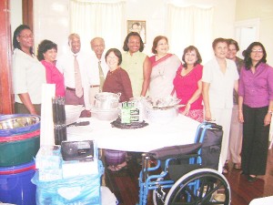  Donors and recipients pose with the items yesterday