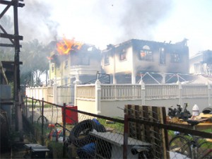 The front of house while it was on fire.