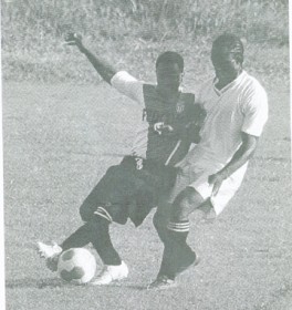  A Houston Stars player (left) is being challenged for possession by a Northern Rangers defender. (Orlando Charles photo)  