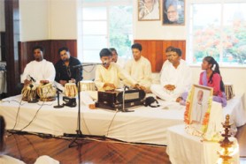 Members of the Indian Cultural Centre (ICC) during a tribute to the late Pandit Prakash Gossai at the ICC building yesterday. 