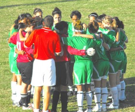 The Lady Jags team undergoing a pep talk prior to the start of the match. (Photo courtesy Colin Baker).    