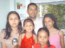 Deanna (second from right) with her parents, Carol and Vijay Ramjit and sisters, Daenia (right) and Vivia. 