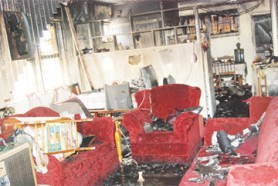 Some of the damage in the lower flat