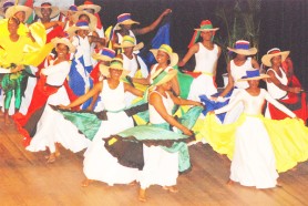 Guyanese welcome:  Members of the National School of Dance and the National Dance Company gyrate to Caribbean sounds during the opening of the 30th Regular Meeting of the Conference of Heads of Government of Caricom at the National Cultural Centre on Thursday evening. (Jules Gibson photo)   