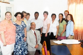 The teachers and Minister Shaik Baksh (sixth from right) (GINA photo) 