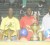 In this Orlando Charles photo, Tournament Coordinator Mark Phillips (left), VK Club Secretary Calvin Marks (centre) and Public Relations Officer Lynton Luke (right) pose with  a few of the prizes on Monday evening at the Cliff Anderson Sports Hall.    