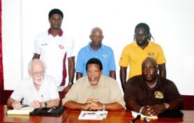 President of the GRFU Noel Adonis sits at centre with president of the WIRU Kit Nascimento (at left) and GRFU secretary Curtis Jacobs. Standing (left to right)  are Claudius Butts, Laurence Adonis and Theodore Henry. (Orlando Charles photo)   