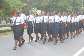 Immigration ladies: Female officers of the Guyana Police Force Immigration Department giving the ‘eyes right’ as they near the podium at Eve Leary yesterday where Commissioner of Police Henry Greene took the salute in the police’s 170th anniversary parade. (Photo by Jules Gibson) 
