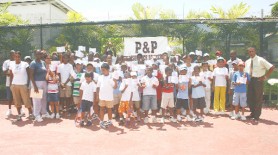 Some of the 80 youths who  took part in the tennis camp sponsored by P & P Insurance Brokers. The event took place over the course of two weeks at the Pegasus Hotel tennis courts.