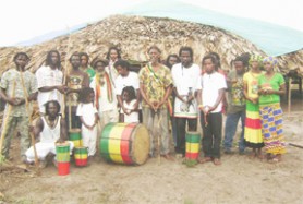 Members of the Wisroc Rastafarian congregation pose in front of the partly completed tabernacle.