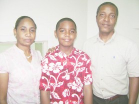 Joel Oswald Haynes flanked by mother Estherann and father Dr. Joseph Haynes