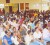 A section of the audience at the orientation. Inset at right is Headmistress Beverly Daly. 