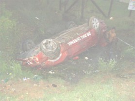 The upturned car in the Manchester trench 