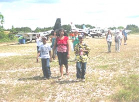  Ravi (left) with his mother during a tour at the Kaieteur National Park.