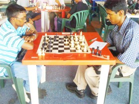 At the DDL Emancipation chess tournament which was held last weekend, juniors from various schools participated. They outnumbered the senior participants. The West Demerara students were impressive with Raan Motilall, participating in his first ever Guyana Chess Federation tournament capturing third place. Sham Khan from Tutorial High won the tournament with his six wins and one draw in the seven-round competition. In photo Sham Khan at right during one of his encounters. 