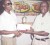 Since he returned from Barbados earlier this year, Wendell Meusa has won four chess tournaments so far for 2009, more than anyone else. Recently, he took the DDL Topco Juice Emancipation tournament without conceding a game. In photo, Kenrick Brathwaite (right), Secretary of the Guyana Chess Federation, presents Meusa with his cheque and first prize trophy at the conclusion of the tournament.