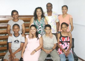 Jackie Ault (second from right, back row) and some of her charges and their parents