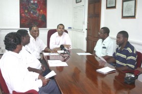 Sport Minister Dr. Frank Anthony (centre) sits with members of the draughts steering committee while addressing the media. Also in photo are Director of Sports, Neil Kumar, Jai Ram, Charles Hetemeyer and Travis Lyken. (Orlando Charles photo) 