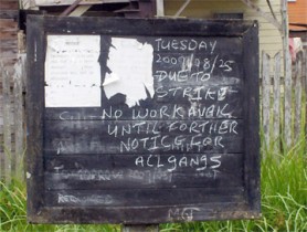 This notice board, located close to the Patentia Public Road, West Bank Demerara, informed sugar workers living at nearby villages of the non-availability of work at the Wales Estate yesterday. 