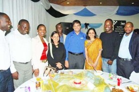 World chess champion Vishy Anand and his wife Aruna, pose for a photograph with executive members of the Botswana Chess Federation. The BCF held a dinner for the champ when he visited Botswana three weeks ago.