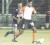 Keeping a close eye! National captain and Alpha United’s defender Howard Lowe closely mark Sunburst Camptown striker Telson McKinnon. (Orlando Charles photo)  